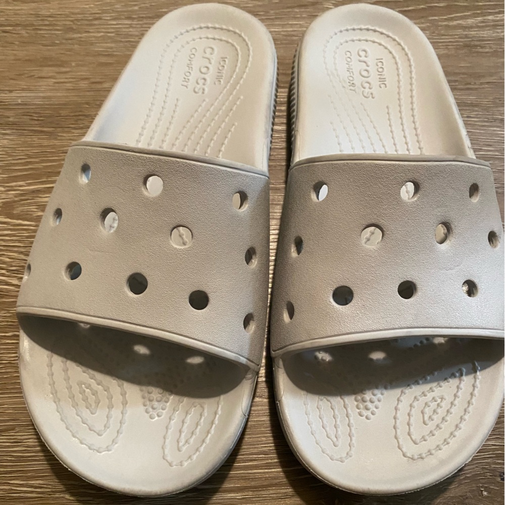 2 pairs of Crocs